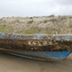A boat from the 2011 Japan tsunami that washed up on the coast of Oregon, barnacles and all.